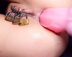 Fisting of Anal instantly Caged Pierced Pussy Nigh unto by Padlock