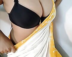 Desi bengali shruti bhabhi teasing with her big natural tits in yellow saree