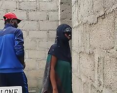 Big-titted Nigerian slut fucking in an uncompleted building.