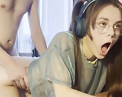 Schoolgirl with ponytails fucks plus plays a video game