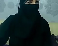 Arab crotchety aunty chaff exposed to camera