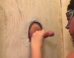 Sucking daddy’s fat cock off through the glory hole!