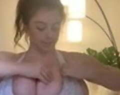 Huge natural tits trying upstairs a bikini top