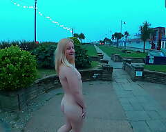 Young blonde exhibitionist wife walking bring to light around Felixstowe seafront, England